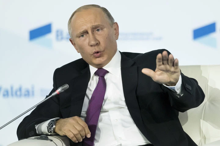 Ông Putin đề nghị người dân Mỹ tôn trọng ông Trump. Ảnh: REUTERS
