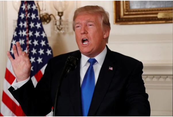 Tổng thống Mỹ Donald Trump nói về thỏa thuận Iran trong một cuộc họp tại Nhà Trắng ngày 13-3. Ảnh: REUTERS