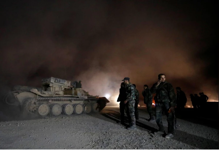 Binh sĩ Syria tại thị trấn Harasta, Đông Ghouta ngày 22-3. Ảnh: REUTERS