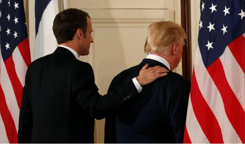 Tổng thống Mỹ Donald Trump (phải) và Tổng thống Pháp Emmanuel Macron rời cuộc họp báo chung tại Nhà Trắng ngày 24-4. Ảnh: REUTERS
