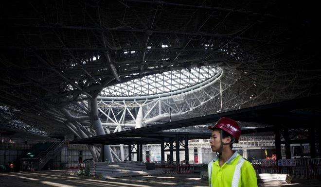 Sân bay Bắc Kinh mới với kinh phí 12 tỉ đô Mỹ đang được xây dựng. Ảnh: BLOOMBERG