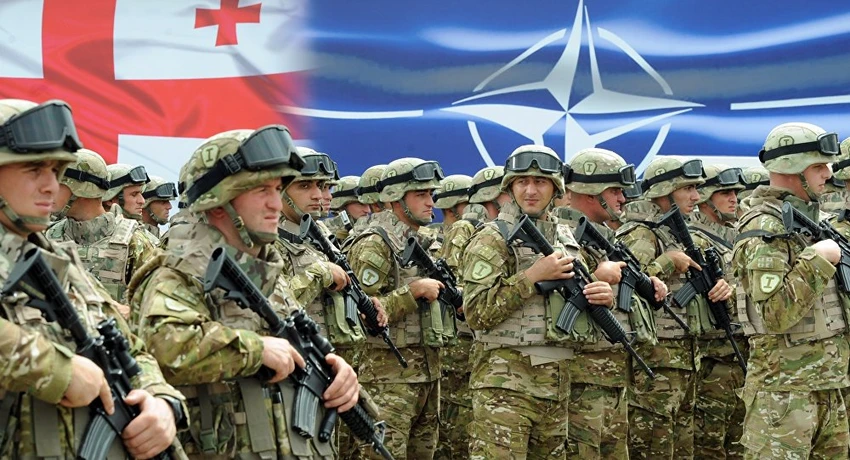 Binh sĩ Georgia trong buổi lễ khánh thành Trung tâm Huấn luyện và Đánh giá chung NATO-Georgian ở căn cứ huấn luyện quân sự Krtsanisi bên ngoài thủ đô Tbilisi (Georgia) ngày 27-8-2015. Ảnh: AP