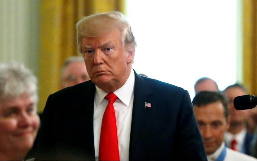 Tổng thống Mỹ Donald Trump tại buổi lễ trao tặng huân chương danh dự cho một sĩ quan không quân tại Nhà Trắng ngày 22-8. Ảnh: REUTERS