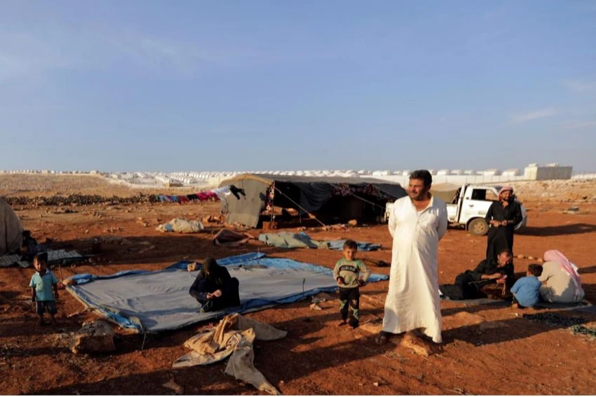 Người dân tỉnh Idlib sơ tán trước nguy cơ có giao tranh. Ảnh: REUTERS