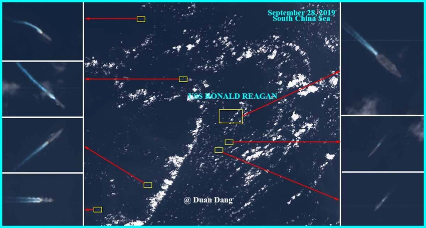 Bức ảnh vệ tinh được thuyết minh là tàu sân bay USS Ronald Reagan của Mỹ bị nhiều tàu chiến Trung Quốc bao vây ở biển Đông. Ảnh: TWITTER