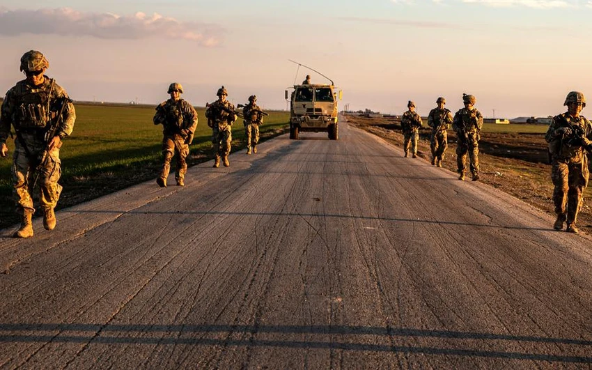 Các binh sĩ của Đội chiến đấu Lữ đoàn bộ binh 37 tuần tra ở Syria, ngày 3-2. Ảnh: US ARMY Các binh sĩ của Đội chiến đấu Lữ đoàn bộ binh 37 tuần tra ở Syria, ngày 3-2. Ảnh: US ARMY
