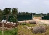 Cán bộ bị ném xuống hồ khi kiểm tra nhà không phép