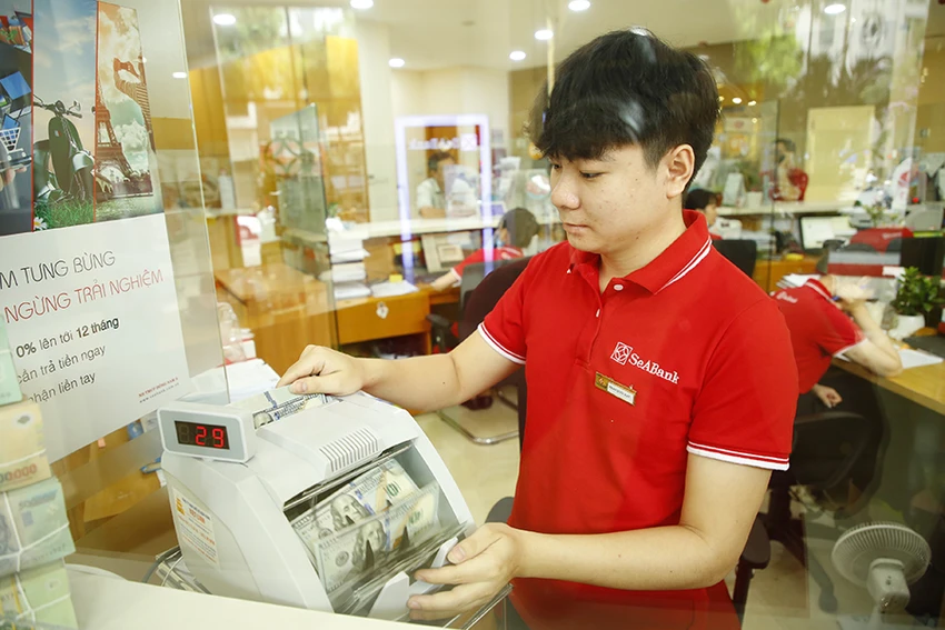 Dự báo khả năng USD tăng đột biến trong năm nay là không lớn. Ảnh: PM