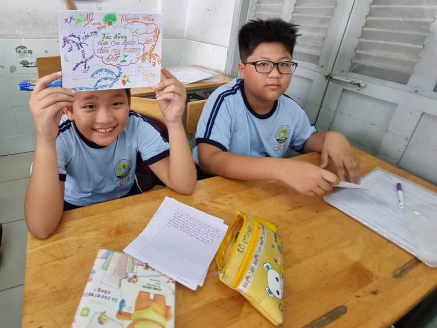 Một tiết học của học sinh lớp 5 Trường Tiểu học Lê Văn Thọ (quận Gò Vấp, TP.HCM). Ảnh: NTCC Một tiết học của học sinh lớp 5 Trường Tiểu học Lê Văn Thọ (quận Gò Vấp, TP.HCM). Ảnh: NTCC