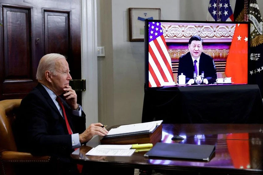 Tổng thống Mỹ Joe Biden (trái) trong một cuộc gặp trực tuyến với Chủ tịch Trung Quốc Tập Cận Bình, hồi tháng 11-2021. Ảnh: REUTERS Tổng thống Mỹ Joe Biden (trái) trong một cuộc gặp trực tuyến với Chủ tịch Trung Quốc Tập Cận Bình, hồi tháng 11-2021. Ảnh: REUTERS