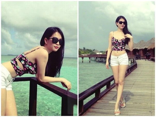 Quần short ngắn tạo dáng năng động, trẻ trung cũng được Ngọc Trinh yêu thích. Cô khéo léo kết hợp quần trắng cùng áo crop top in họa tiết hoa nữ tính, phù hợp với xu hướng mùa hè. Nhập mô tả cho ảnh