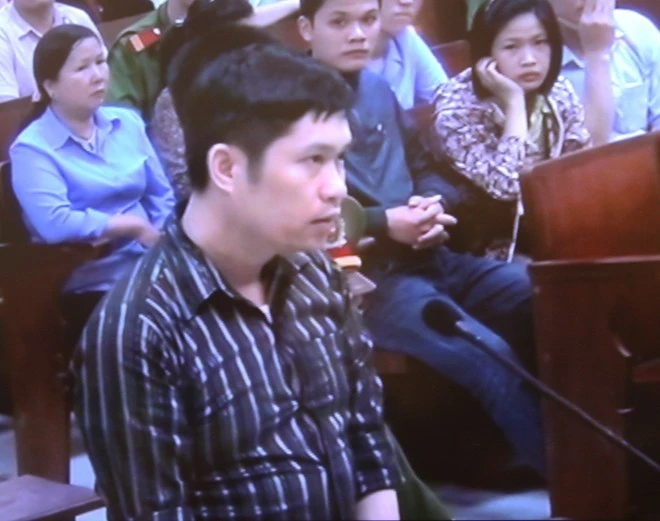 Nguyễn Mạnh Tường tại phiên xử ngày 14/4/2014. Nhập mô tả cho ảnh
