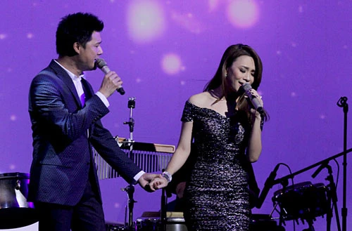 Ca sĩ Quang Dũng song ca với Mỹ Tâm nhạc phẩm "Yêu thương mong manh". Quang-Dung-My-Tam-9124-1405483971.jpg