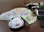 Công an vây bắt đánh bạc,bí thư phường nhảy lầu bỏ trốn