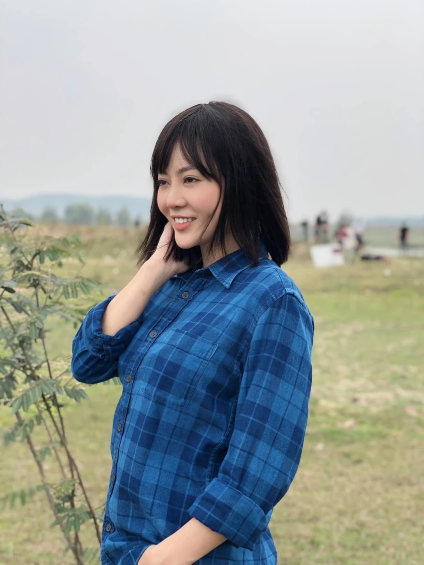 7-my-le-thanh-huong-mua-hoa-tim-lai_BPOS.jpg