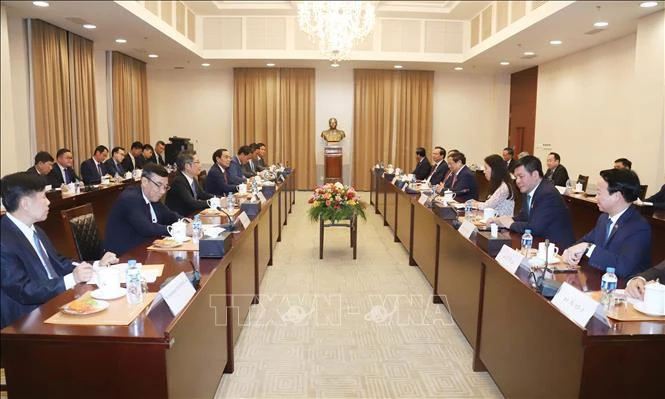 Thủ tướng Phạm Minh Chính hội kiến Thường trực Ban Bí thư, Phó Chủ tịch nước Lào