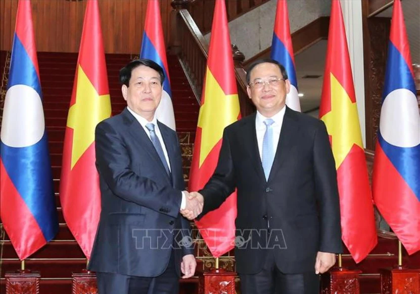 chu-tich-nuoc-luong-cuong-hoi-kien-thu-tuong-chinh-phu-lao-sonexay-siphandone.jpg