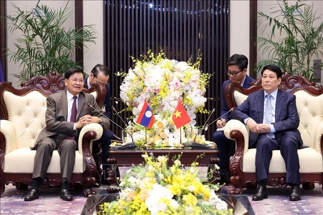 chu-tich-nuoc-luong-cuong-tiep-tong-bi-thu-chu-tich-nuoc-lao-thongloun-sisoulith.jpg
