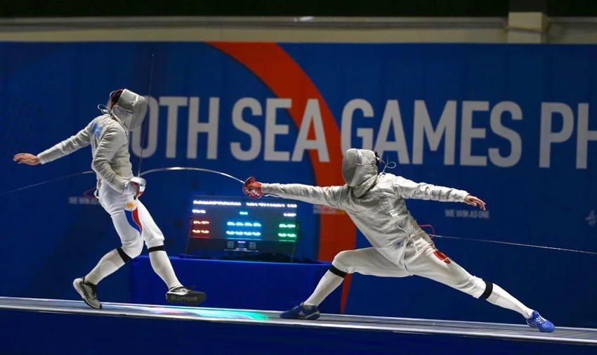Kiếm thủ Vũ Thành An (phải) hiện đang là ĐKVĐ nội dung kiếm chém nam tại SEA Games. ẢNH: PHẠM HUY Kiếm thủ Vũ Thành An (phải) hiện đang là ĐKVĐ nội dung kiếm chém nam tại SEA Games. ẢNH: PHẠM HUY