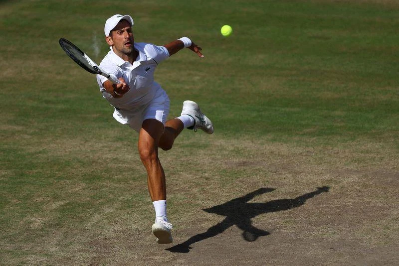 Vừa vô địch Wimbledon nhưng Djokovic không thể tham dự Mỹ mở rộng. Ảnh: REUTERS Vừa vô địch Wimbledon nhưng Djokovic không thể tham dự Mỹ mở rộng. Ảnh: REUTERS