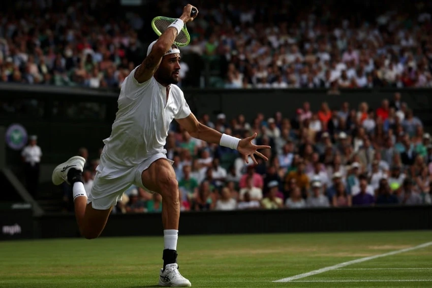 Á quân 2021 Berrettini thua ngược trước đối thủ số 1 thế giới. Ảnh: GETTY Á quân 2021 Berrettini thua ngược trước đối thủ số 1 thế giới. Ảnh: GETTY