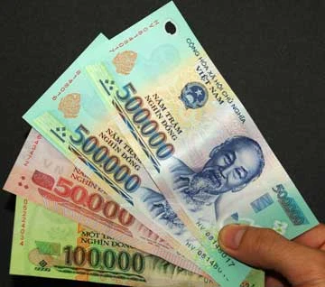 Phân biệt tiền thật, tiền giả bằng cách nào? ảnh 1 Phân biệt tiền thật, tiền giả bằng cách nào? ảnh 1