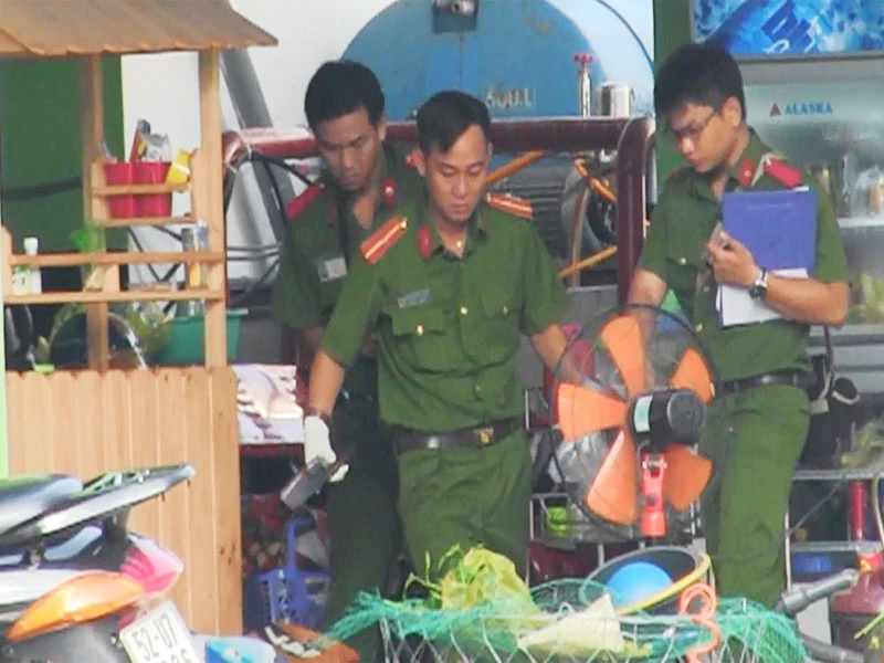 Người đàn ông chết với nhiều vết thương ở tiệm rửa xe ảnh 1