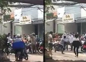 Chạy xe kéo thùng hàng đi bán dạo, tấn công tổ công tác khi bị nhắc