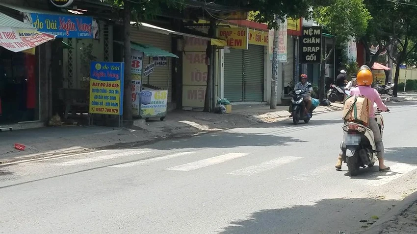 Tiệm vé số trên đường Nguyễn Thị Đặng nơi xảy ra vụ việc. Ảnh: NT Tiệm vé số trên đường Nguyễn Thị Đặng nơi xảy ra vụ việc. Ảnh: NT