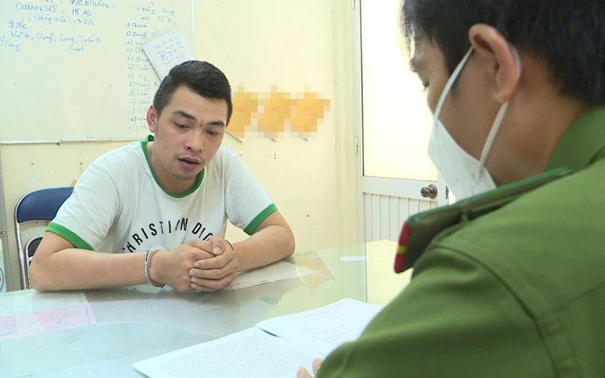 Nguyễn Quốc Huy tại cơ quan công an. Ảnh: CA
