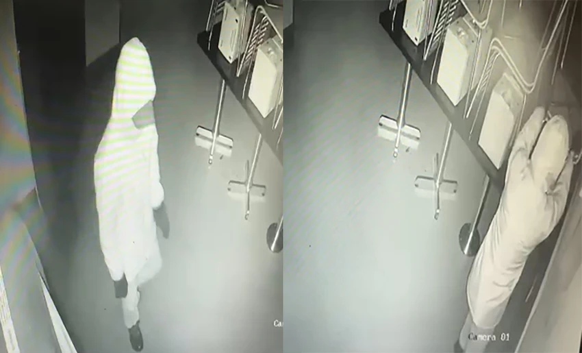 Hình ảnh Nam bước ra từ nhà vệ sinh và lục lọi tài sản trong nhà hàng lúc 0 giờ ngày 27-4. Ảnh cắt từ clip Hình ảnh Nam bước ra từ nhà vệ sinh và lục lọi tài sản trong nhà hàng lúc 0 giờ ngày 27-4
