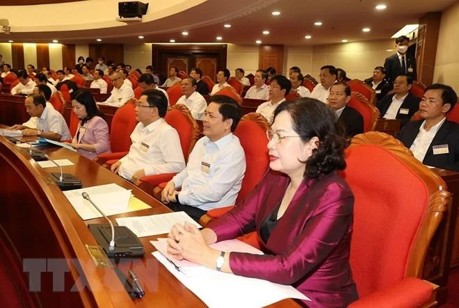 Các lãnh đạo Đảng, Nhà nước và các đại biểu dự Hội nghị. Ảnh: TTXVN nghi-quyet-26-bo-chinh-tri