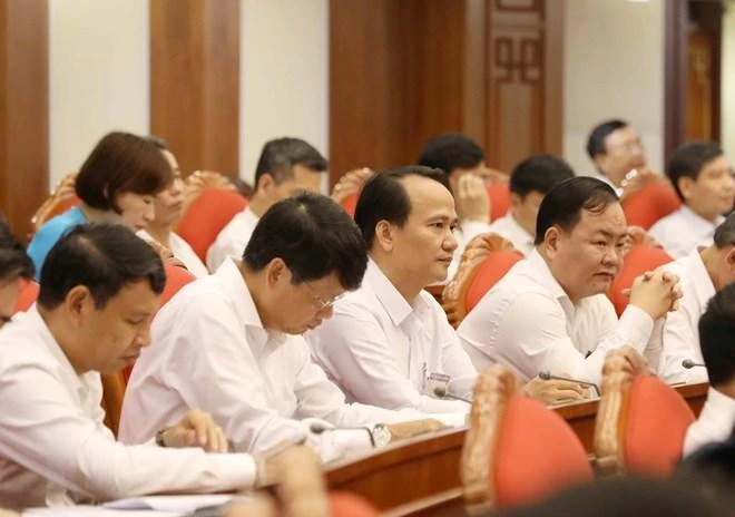 Các lãnh đạo Đảng, Nhà nước và các đại biểu dự Hội nghị. Ảnh: TTXVN nghi-quyet-26-bo-chinh-tri