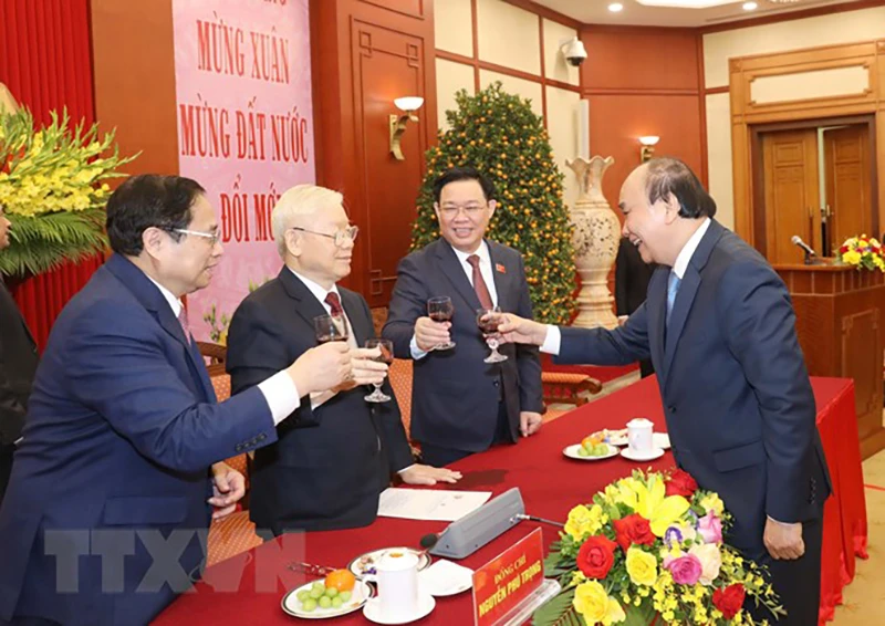 Các lãnh đạo Đảng, Nhà nước tham dự buổi chúc Tết. Ảnh: TTXVN