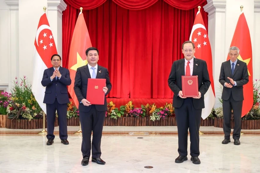 Bản ghi nhớ giữa hai Bộ Công Thương về kế hoạch hợp tác kinh tế và thương mại được ký kết bởi Bộ trưởng Bộ Công Thương Nguyễn Hồng Diên và Bộ trưởng thứ hai Bộ Công Thương kiêm Bộ trưởng Bộ Lao động Singapore Tan See Leng. Ảnh: VGP Bản ghi nhớ giữa hai Bộ Công Thương về kế hoạch hợp tác kinh tế và thương mại được ký kết bởi Bộ trưởng Bộ Công Thương Nguyễn Hồng Diên và Bộ trưởng thứ hai Bộ Công Thương kiêm Bộ trưởng Bộ Lao động Singapore Tan See Leng. Ảnh: VGP