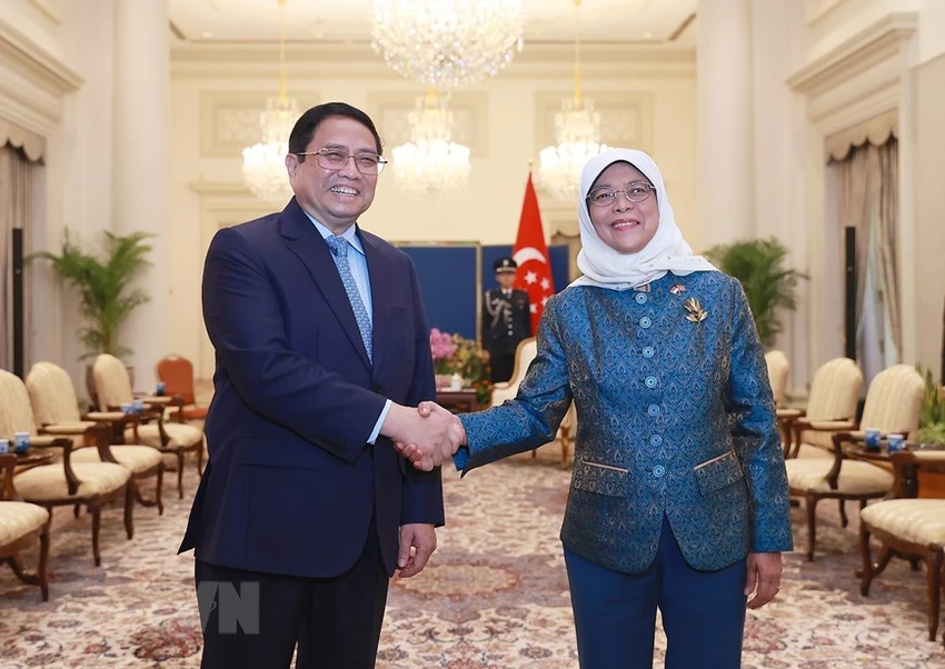 Thủ tướng Phạm Minh Chính hội kiến với Tổng thống Cộng hòa Singapore Halimah Yacob ngay sau lễ đón chính thức. Ảnh: TTXVN Thủ tướng Phạm Minh Chính hội kiến với Tổng thống Cộng hòa Singapore Halimah Yacob ngay sau lễ đón chính thức. Ảnh: TTXVN