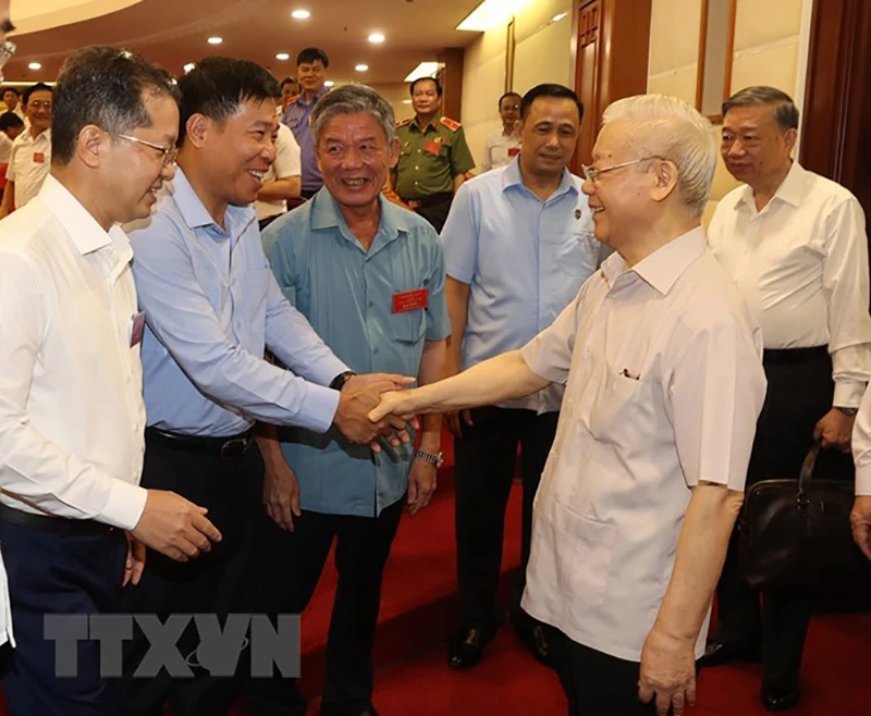 Tổng Bí thư Nguyễn Phú Trọng cùng các đại biểu tham dự hội nghị. Ảnh: TTXVN
