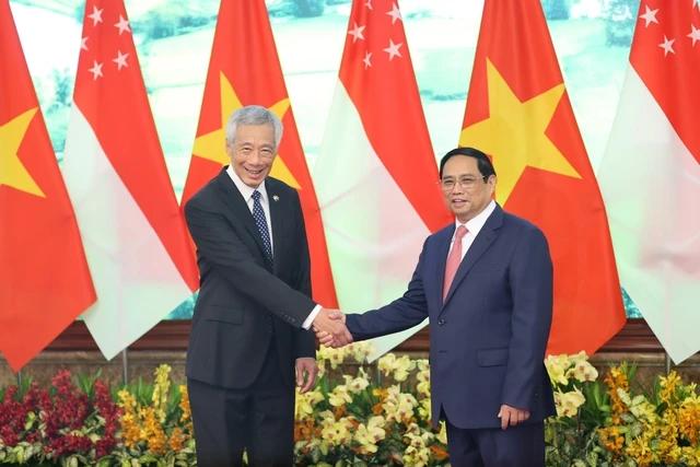 Sau lễ đón, Thủ tướng Phạm Minh Chính và Thủ tướng Singapore Lý Hiển Long tiến hành hội đàm: Ảnh: VGP Sau lễ đón, Thủ tướng Phạm Minh Chính và Thủ tướng Singapore Lý Hiển Long tiến hành hội đàm: Ảnh: VGP
