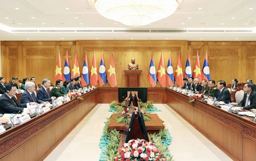 le-don-chinh-thuc-chu-tich-nuoc-to-lam-tham-cap-nha-nuoc-toi-lao.jpg