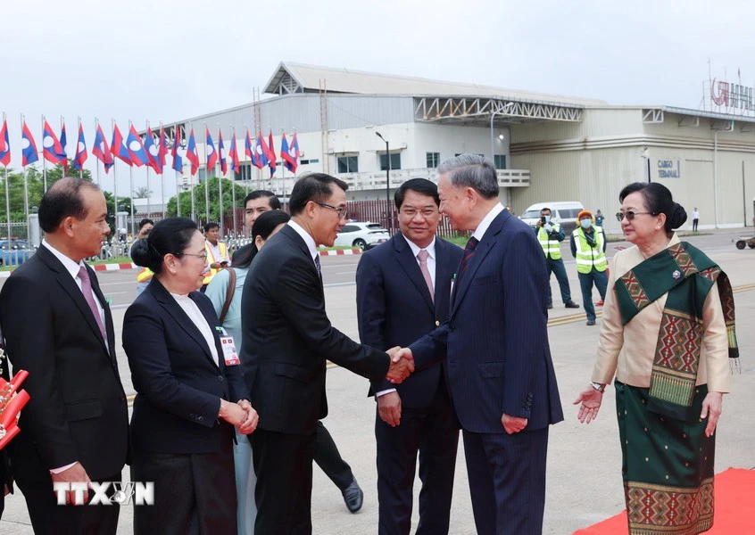 ttxvn-1107-chu-tich-nuoc-to-lam-lao-6-9124.jpg