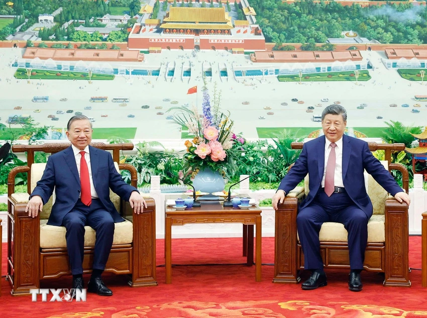 tong-bi-thu-chu-tich-nuoc-to-lam-va-phu-nhan-cung-tong-bi-thu-chu-tich-nuoc-tap-can-binh-va-phu-nhan-du-tiec-tra-2-resize.jpg