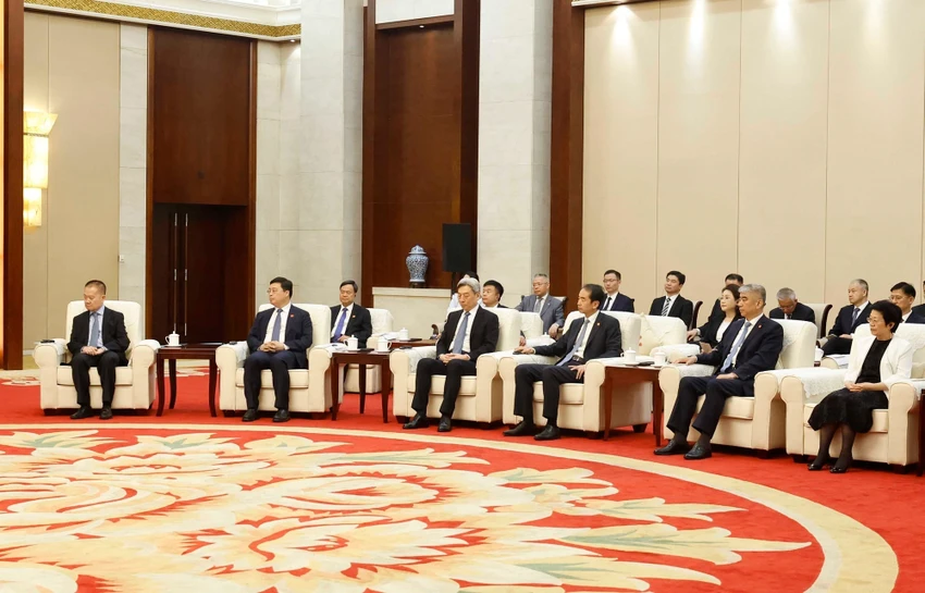 tong-bi-thu-chu-tich-nuoc-to-lam-tiep-bi-thu-quang-tay-ttxvn.jpg