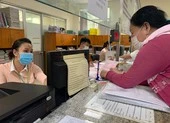 Ký tại 22 chi nhánh quận, huyện, giảm trễ hạn cấp sổ hồng