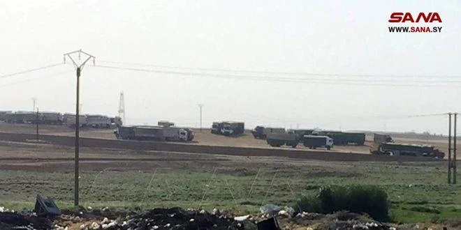 Hãng thông tấn nhà nước Syria SANA cáo buộc lực lượng Mỹ đã trộm nhiều tấn lúa mì từ nước này và vận chuyển chúng sang Iraq. Ảnh: SANA
