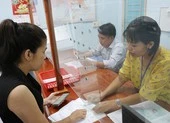 TP.HCM: Cán bộ bị dồn việc khi giảm gần 2.300 người