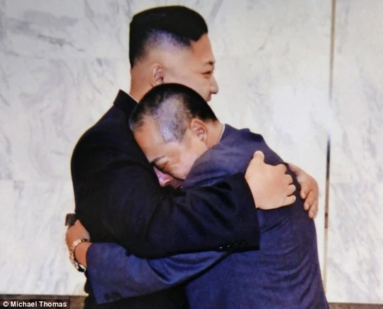 Reunited: Kenji Fujimoto,who spent more than a decade as Kim Jong Uns companion, with the dictator in North Korea in 2012