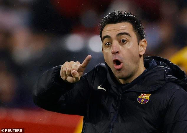Xavi rất muốn có Maguire. ẢNH: REUTERS Xavi rất muốn có Maguire. ẢNH: REUTERS