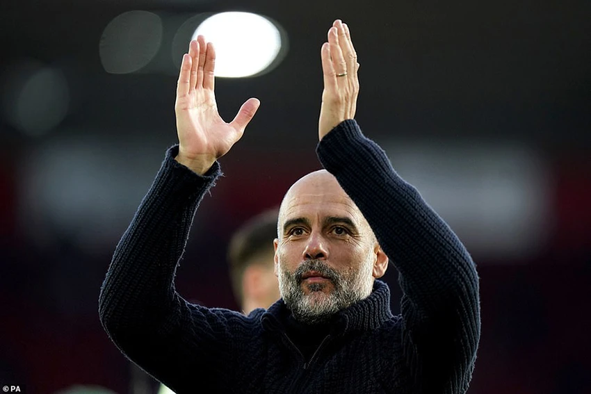 Pep Guardiola hết lời ca ngợi Haaland và so sánh anh với Messi, Ronaldo. ẢNH: PA