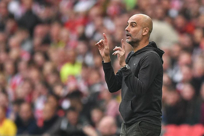 Pep Guardiola chắc chắn muốn Man City tái hiện cú ăn ba lịch sử của kình địch Man Utd. ẢNH: GETTY Pep Guardiola chắc chắn muốn Man City tái hiện cú ăn ba lịch sử của kình địch Man Utd. ẢNH: GETTY