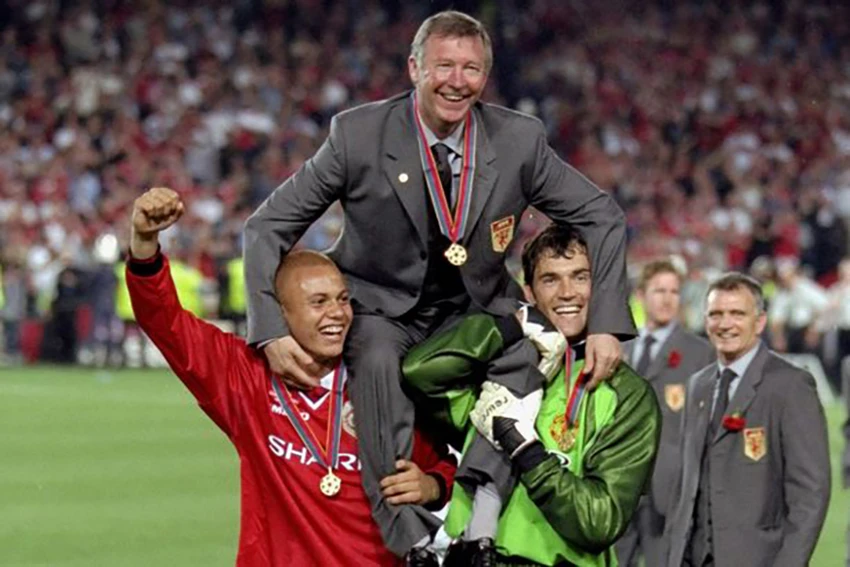MU giành cú ăn ba lịch sử năm 1999 dưới thời Sir Alex Ferguson. ẢNH: GETTY MU giành cú ăn ba lịch sử năm 1999 dưới thời Sir Alex Ferguson. ẢNH: GETTY